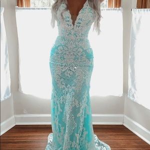 Blue/White heavily detailed prom dress. Comes with detachable train.